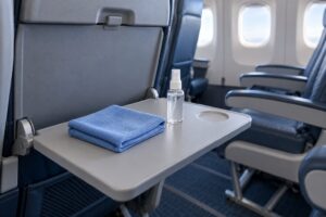 how airplane tray tables are cleaned